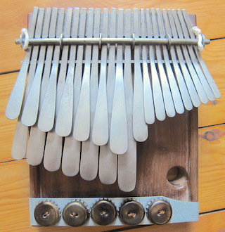 Mbira dzavadzimu G# / Ab Dindinyongwe by Sebastian Pott Round Keys, 1 of 1